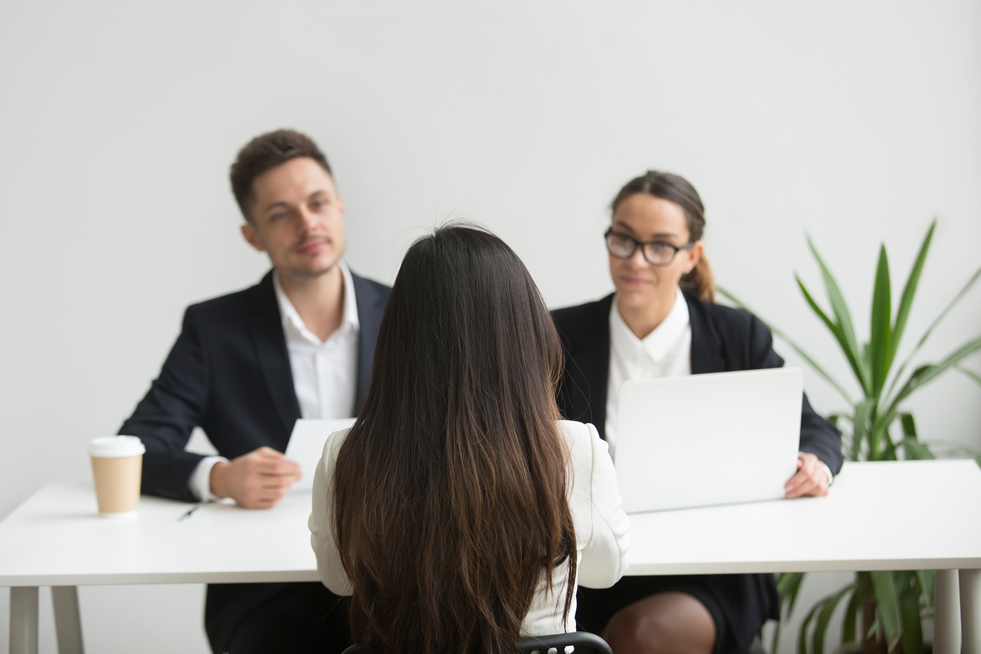 headhunters interviewing female job candidate 1